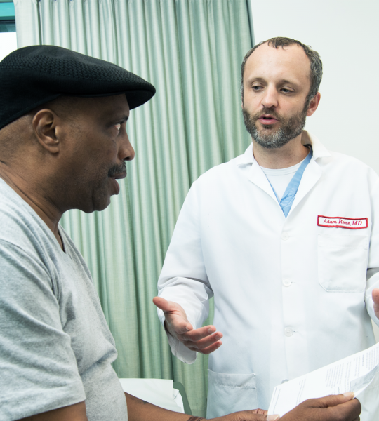 Urology doctor talking to patient